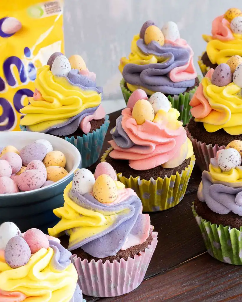 Delicious Cadbury's mini egg chocolate easter cupcakes ready to be enjoyed! Recipe by movers and bakers