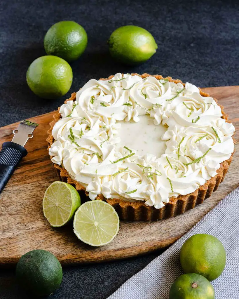 My eggless key lime pie is perfect for entertaining! Make ahead, creamy and full of flavour, this beautiful pie will be adored by everyone to tries it! Recipe by movers and bakers
