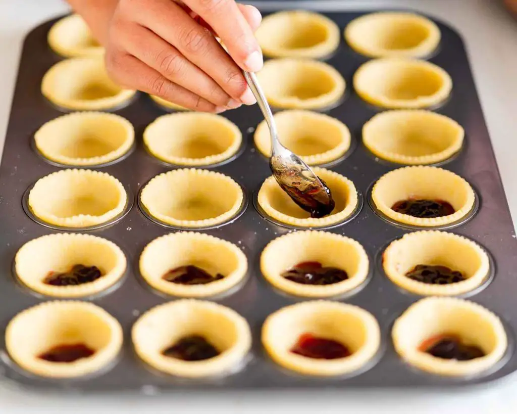 Mini cherry bakewell tarts. Recipe by movers and bakers