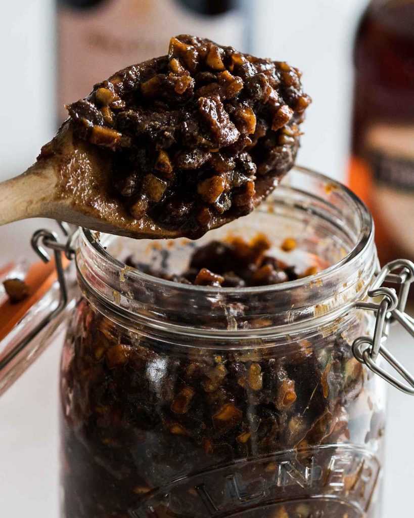 Vegan mincemeat decanted and stored to allow the flavours to develop. It can be used immediately after making, but is so much nicer a few weeks later! Recipe by movers and bakers