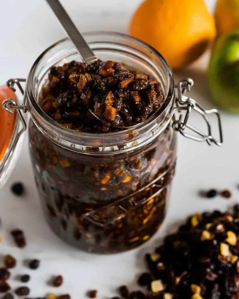 My vegan mincemeat is made with a beautiful mix of dried fruit, nuts and spices and a few generous spoonfuls of alcohol to get you in the festive mood! Recipe by movers and bakers