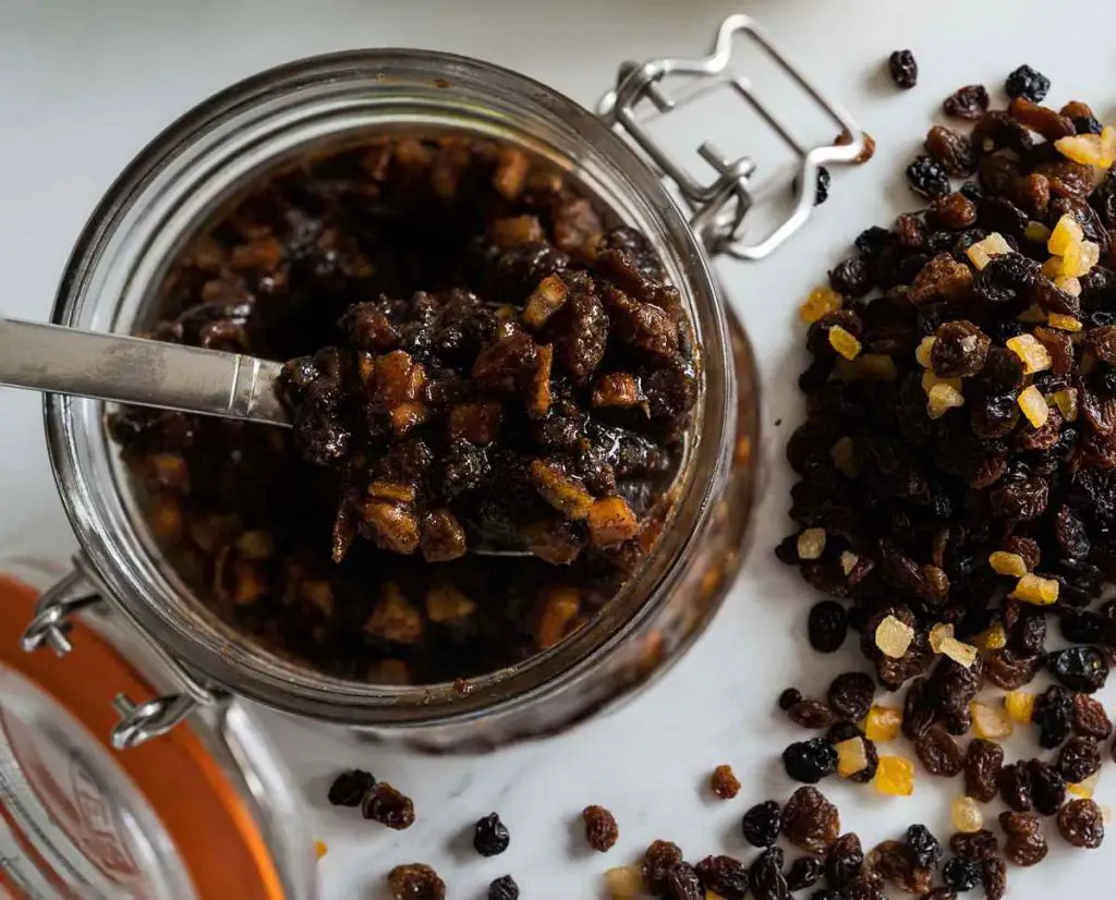 My vegan mincemeat is made with a beautiful mix of dried fruit, nuts and spices and a few generous spoonfuls of alcohol to get you in the festive mood! Recipe by movers and bakers