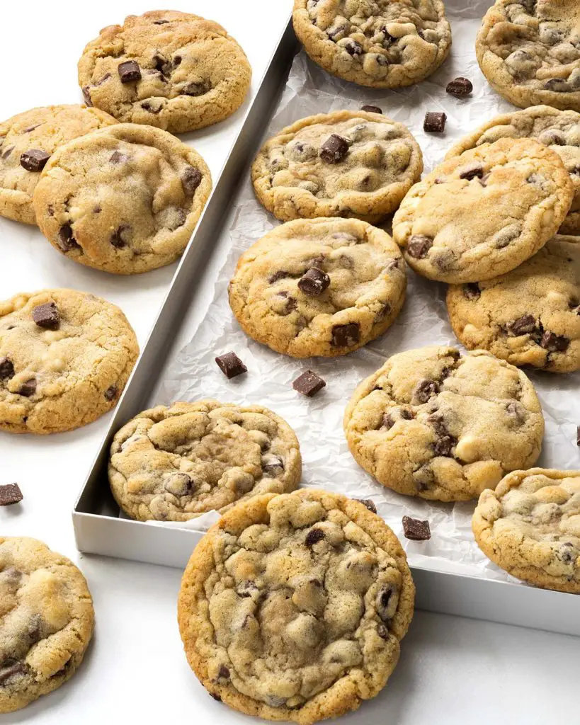 Eggless chocolate chip cookies are soft and chewy and so easy to make! Make a couple batch, you won't regret it! Recipe by movers and bakers