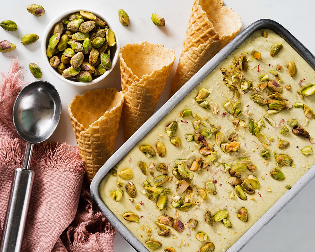 Recipe for kesar pista ice cream. A creamy no churn pistachio ice cream with saffron and cardamom, and no ice cream maker needed! Recipe by movers and bakers