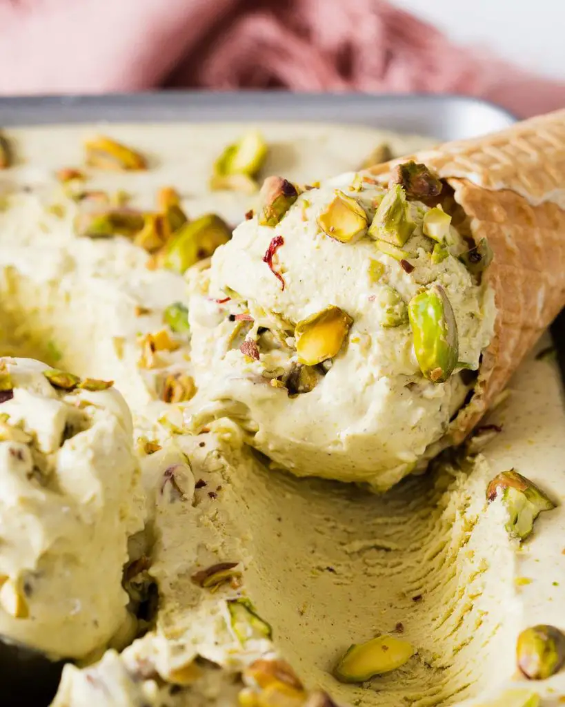 Recipe for kesar pista ice cream. A creamy no churn pistachio ice cream with saffron and cardamom, and no ice cream maker needed! Recipe by movers and bakers 