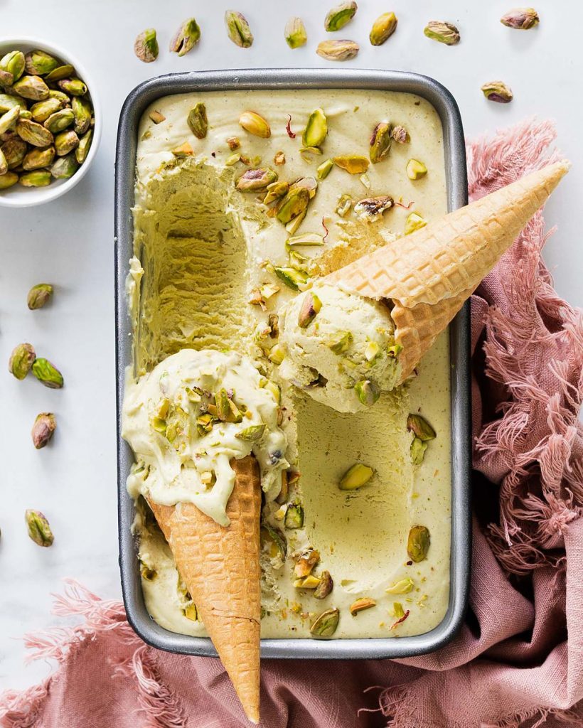 Recipe for kesar pista ice cream. A creamy no churn pistachio ice cream with saffron and cardamom, and no ice cream maker needed! Recipe by movers and bakers