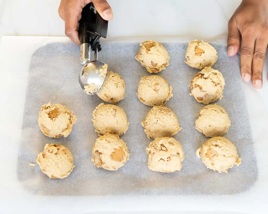 Portion the dough into equal sized balls before chilling and baking. Recipe by movers and bakers