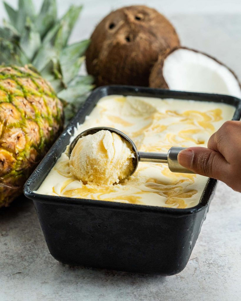 Pineapple coconut ice cream. Remember to leave the ice cream out for about 10 minutes to soften before scooping! Recipe by movers and bakers
