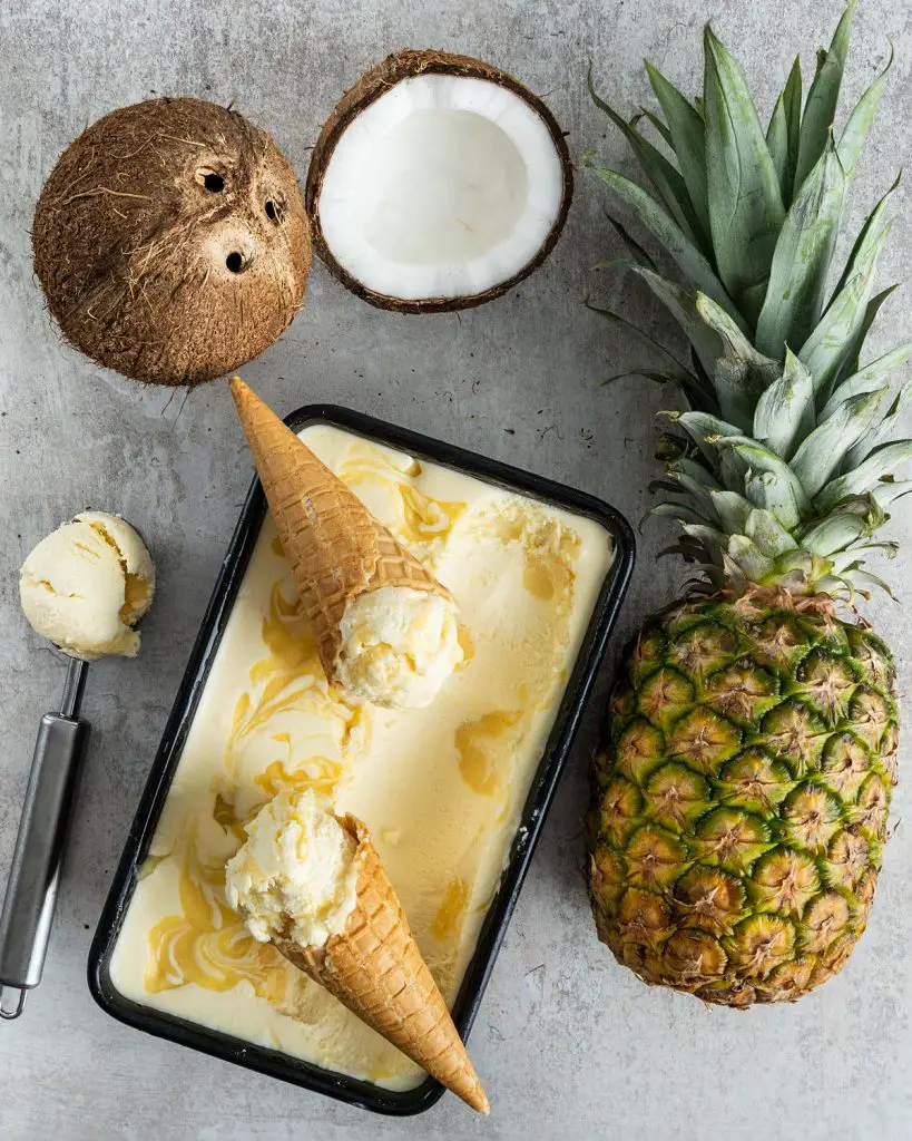 Pineapple coconut ice cream. If you love piña coladas, this ice cream is for you! Recipe by movers and bakers