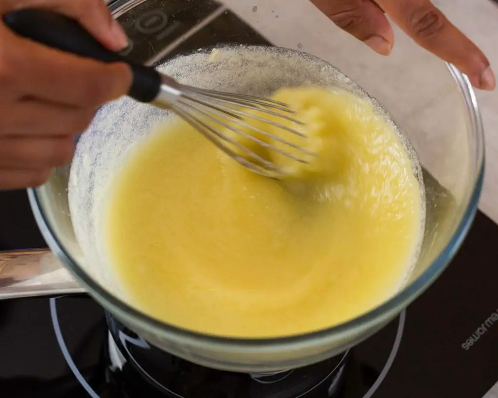 Whisking the mixture whilst heating helps melt the butter and dissolve the sugar. Recipe by movers and bakers