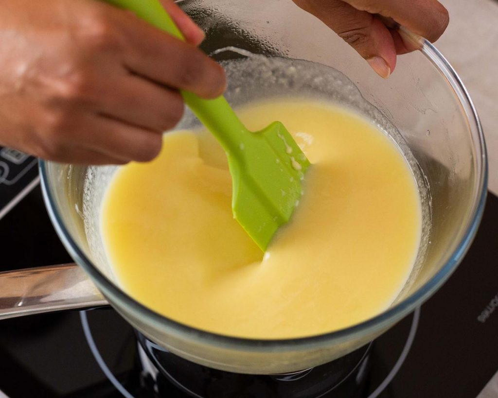 Once the eggs are added, return the mixture to the heat, stirring constantly until it has thickened. Recipe by movers and bakers