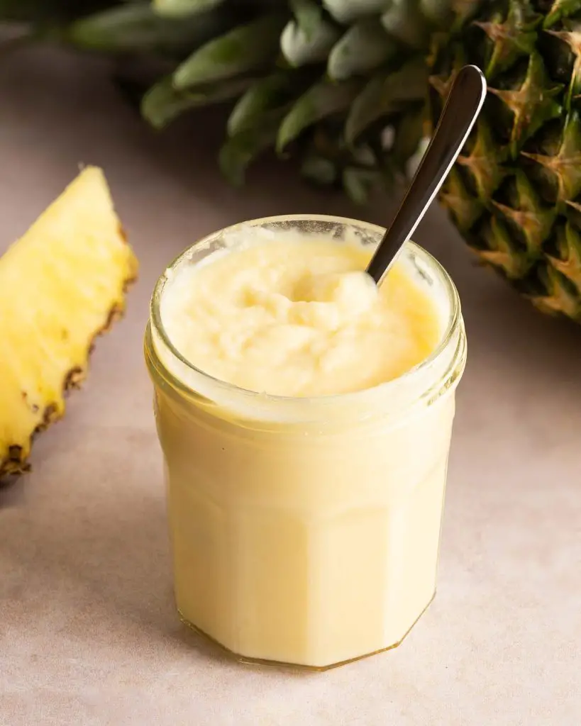 Pineapple curd. A delicious vibrant curd, brilliant to use in bakes and to top pancakes, waffles and ice cream. Recipe by movers and bakers