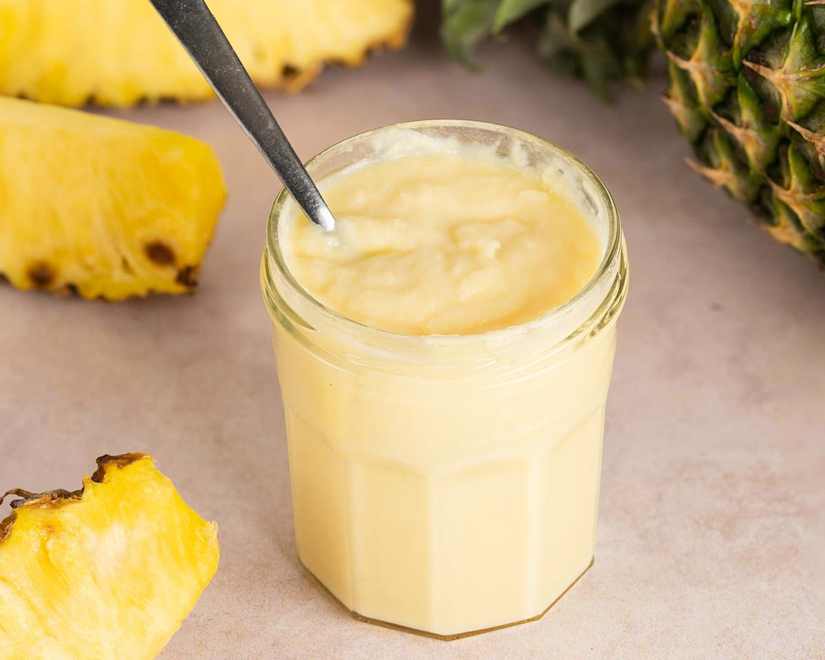 Pineapple curd. A delicious vibrant curd, brilliant to use in bakes and to top pancakes, waffles and ice cream. Recipe by movers and bakers