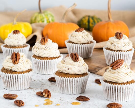 Pumpkin Spice Cupcakes. These delicious, warming pumpkin cupcakes are so light and fluffy, and are topped with the most incredible maple pecan buttercream! A perfect autumnal bake! Recipe by movers and bakers #pumpkinspicecupcakes #pumpkinspice #autumnbaking #pumpkincupcakes