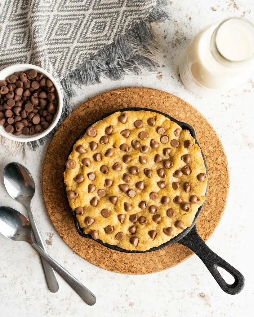 Chocolate chip skillet cookie. Wonderfully crisp on the outside and soft and chewy in the middle. Perfect served with ice cream and lashings of sauce drizzled all over! Recipe by movers and bakers