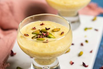 Indian rice pudding, with the beautiful flavours of cardamom, saffron and pistachio in a smooth and creamy comforting dessert. Recipe by movers and bakers