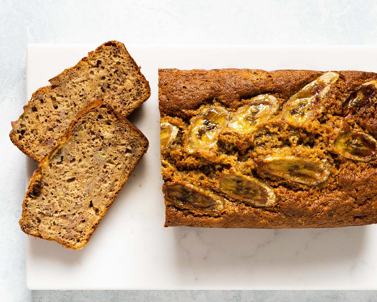 4 ingredient banana bread. A moist and delicious banana bread made with just four basic ingredients, perfect for using up overripe bananas and baking with kids! Recipe by movers and bakers