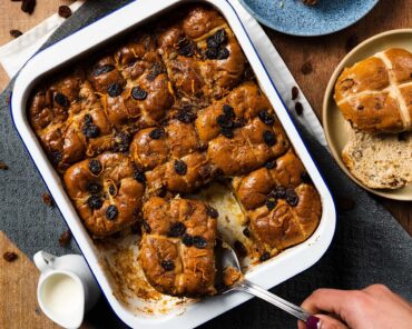 Hot cross bun bread and butter pudding. A mashup recipe featuring yummy Easter buns and a delicious orange spiced custard baked until divine and totally irresistible! Recipe by movers and bakers