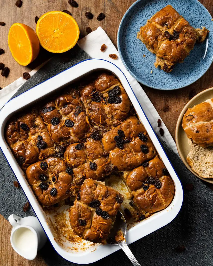 Hot cross bun bread and butter pudding. A mashup recipe featuring yummy Easter buns and a delicious orange spiced custard baked until divine and totally irresistible! Recipe by movers and bakers