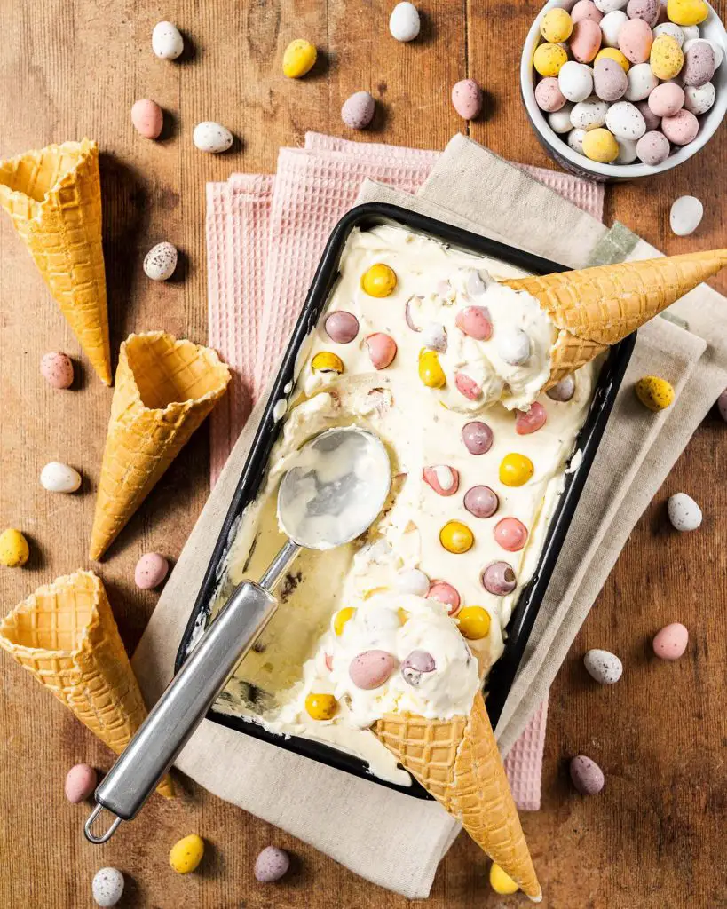 Mini egg ice cream. An easy, 4 ingredient no churn ice cream. Perfect Easter treat for all the family! Recipe by movers and bakers