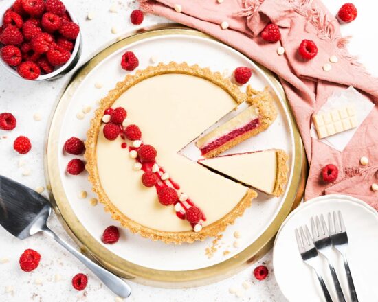 White chocolate and raspberry tart. A wonderful layered tart that is deceptively simple to make, and perfect for entertaining or special occasions! Recipe by movers and bakers