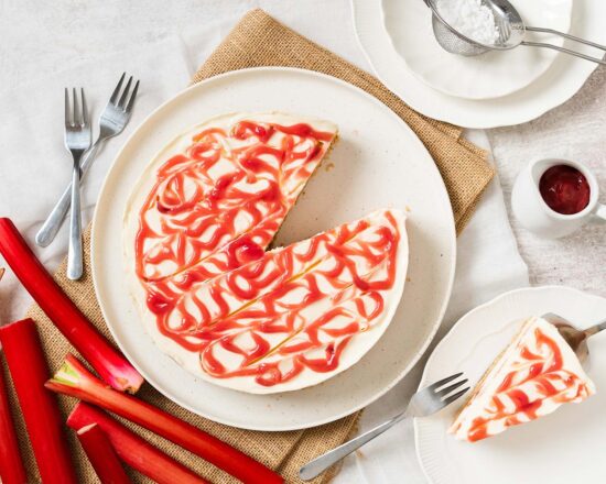 Rhubarb cheesecake. Tangy vanilla cheesecake with delicious swirls of rhubarb throughout make this pretty cheesecake perfect for any occasion! Recipe by movers and bakers