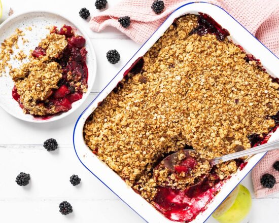 Apple and blackberry crumble. A delicious autumnal favourite, with the stunning combination of seasonal apples and blackberries topped with a crunchy crumble topping. Perfect served with cream, ice cream or custard, or just enjoyed on its own. Recipe by movers and bakers