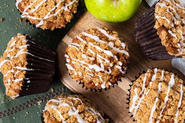 Apple cinnamon muffins. Tender and moist muffins packed with apple and cinnamon flavour topped with a beautiful crunchy cinnamon streusel topping. Recipe by movers and bakers