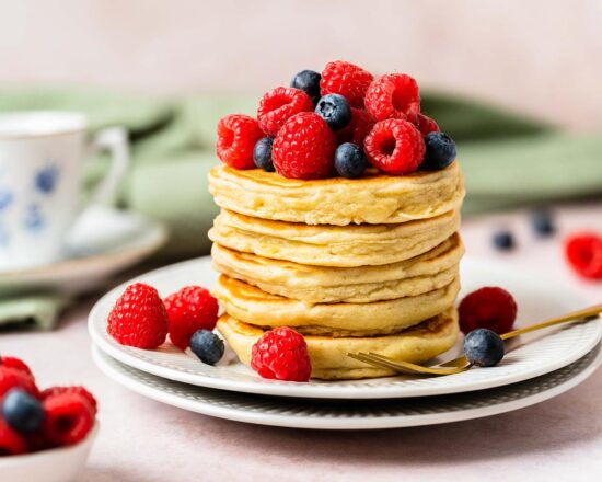 Fluffy American pancakes. These thick beauties are light and fluffy and perfect for lazy brunches or just as an extra special treat! Recipe by movers and bakers