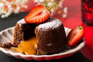 These caramel lava cakes have a beautiful salted caramel filling that is just to die for, encased in a light and delicious chocolate cake. Serve with some fresh berries and a scoop of ice cream for pure dessert heaven! Recipe by movers and bakers