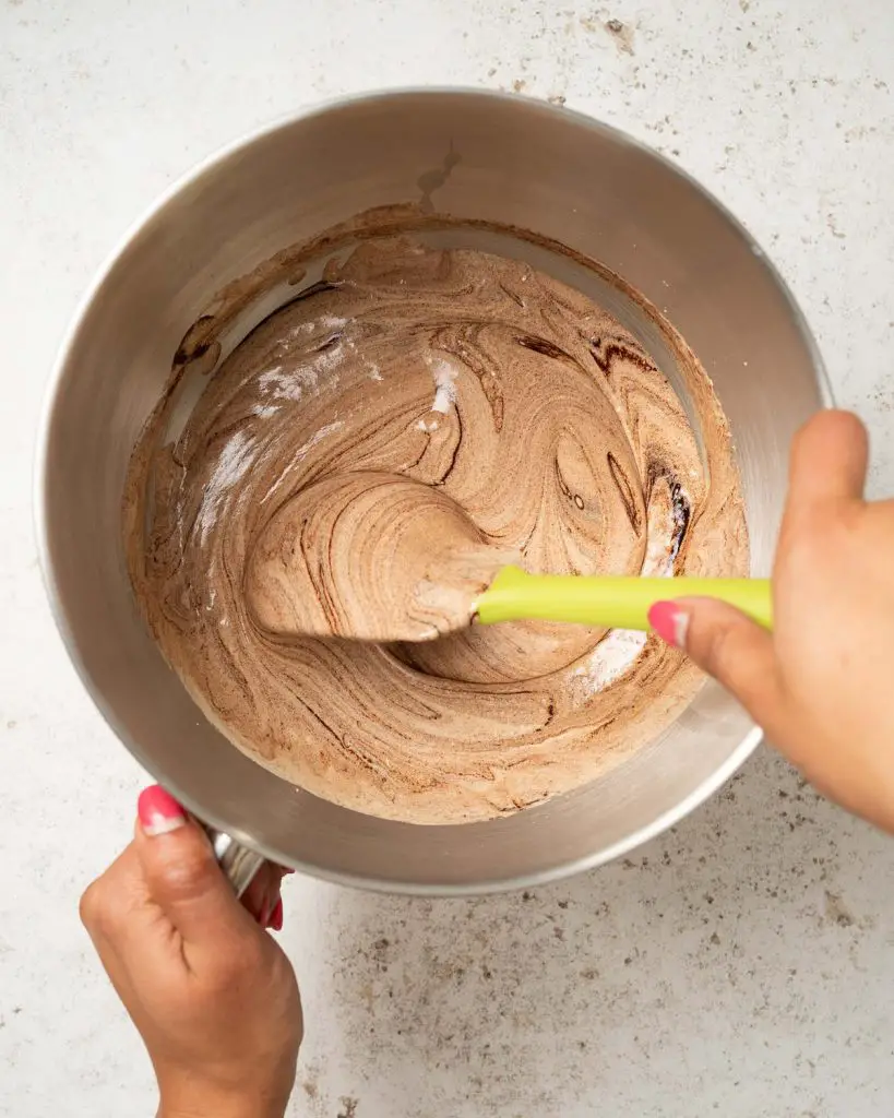 Folding the cocoa mixture in with the whipped eggs...