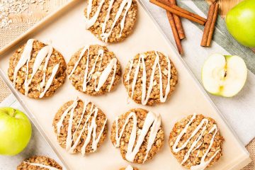 My apple and cinnamon cookies are homely and comforting, with chewy oats and a delicious (optional!) maple drizzle. Recipe by movers and bakers