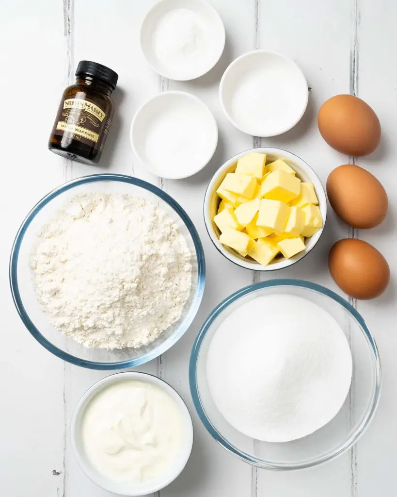 Ingredients for the cake: unsalted butter, caster sugar, plain (all purpose) flour, baking powder, bicarbonate of soda (baking soda), salt, yogurt, eggs and vanilla. Recipe by movers and bakers