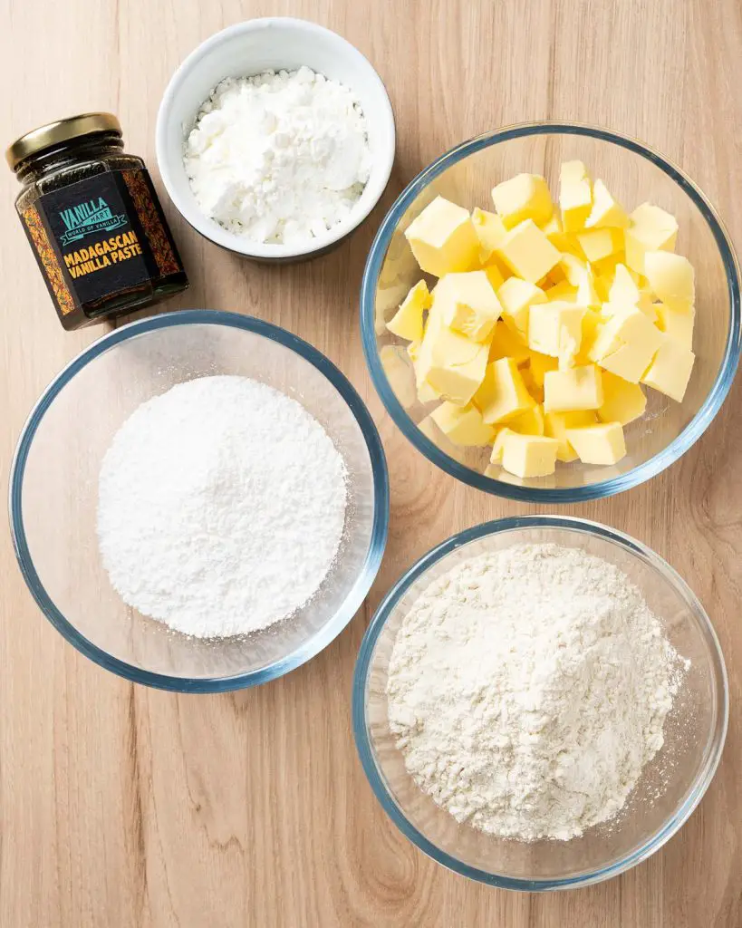 Ingredients required: unsalted butter, icing (powdered) sugar, plain (all purpose) flour, cornflour (cornstarch) and vanilla. Recipe by movers and bakers