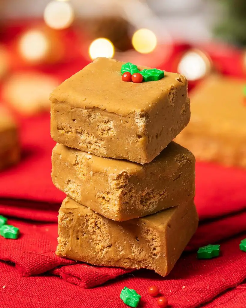 My gingerbread fudge is a festive delight! It is melt-in-your-mouth smooth and creamy, and packed with plenty of delicious spices perfectly reminiscent of the holiday favourite! Recipe by movers and bakers