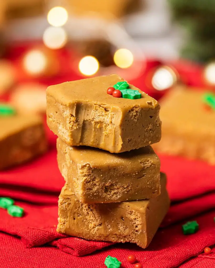 My gingerbread fudge is a festive delight! It is melt-in-your-mouth smooth and creamy, and packed with plenty of delicious spices perfectly reminiscent of the holiday favourite! Recipe by movers and bakers