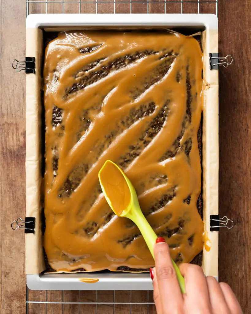 Once the cake has baked, spread some of the sauce over the top before cutting and serving. Recipe by movers and bakers