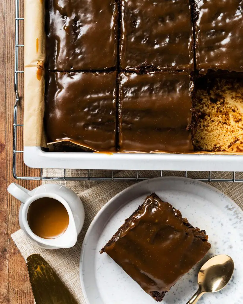 Sticky toffee pudding is a British classic dessert. It has a rich dark date sponge and a gloriously decadent toffee sauce. Enjoy warm with ice cream, cream or custard. Recipe by movers and bakers