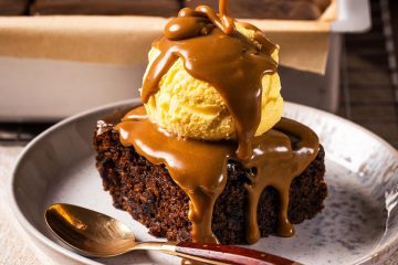 Sticky toffee pudding is a British classic dessert. It has a rich dark date sponge and a gloriously decadent toffee sauce. Enjoy warm with ice cream, cream or custard. Recipe by movers and bakers