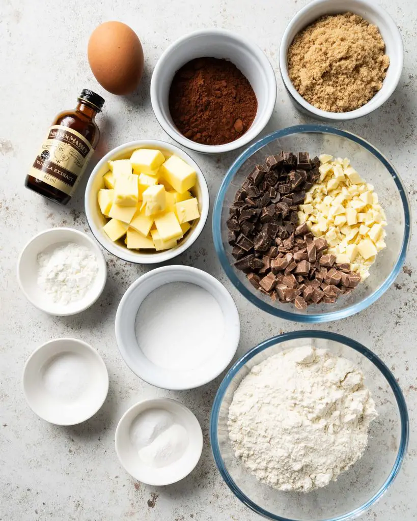 Ingredients required: unsalted butter, caster sugar, light brown sugar, vanilla, plain (all purpose) flour, cornflour, baking powder, bicarbonate of soda (baking soda), salt, chopped chocolate and an egg. Recipe by movers and bakers