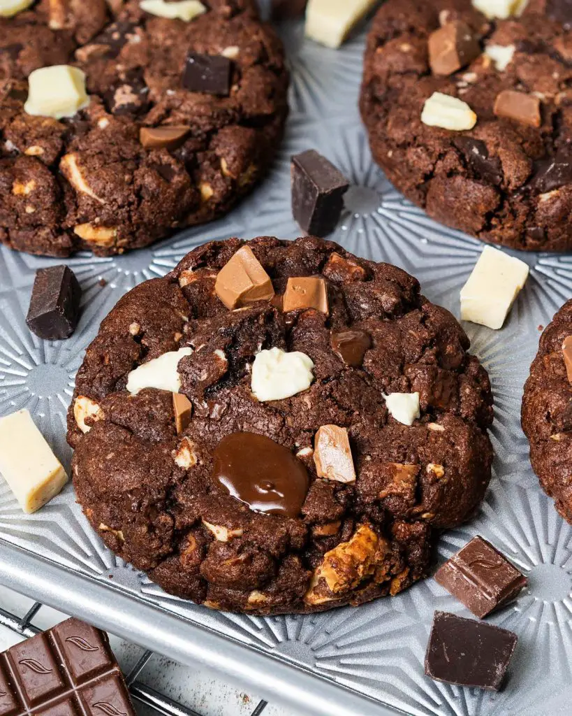 My triple chocolate cookies are chunky and chewy, packed with plenty of milk, dark and white chocolate chunks. Make these for the chocoholics in your world and they will love you FOREVER! Recipe by movers and bakers