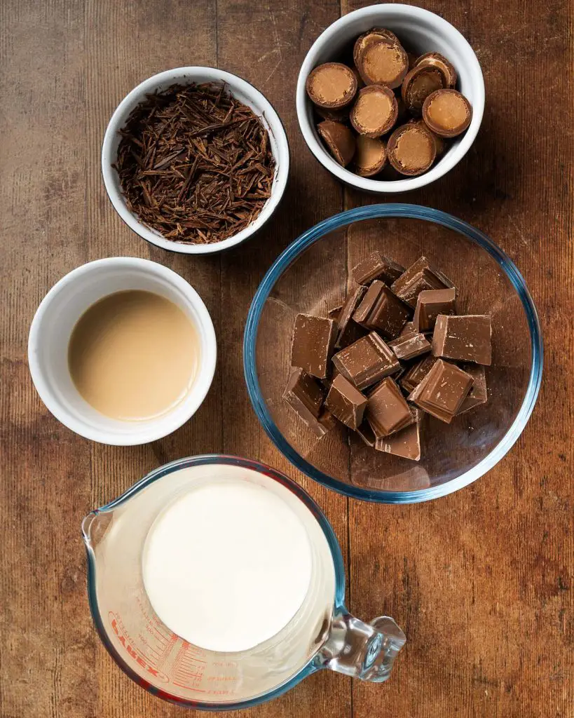 Ingredients required for the topping and decoration: double cream, milk chocolate, chocolate shavings, Baileys and Baileys truffles. Recipe by movers and bakers