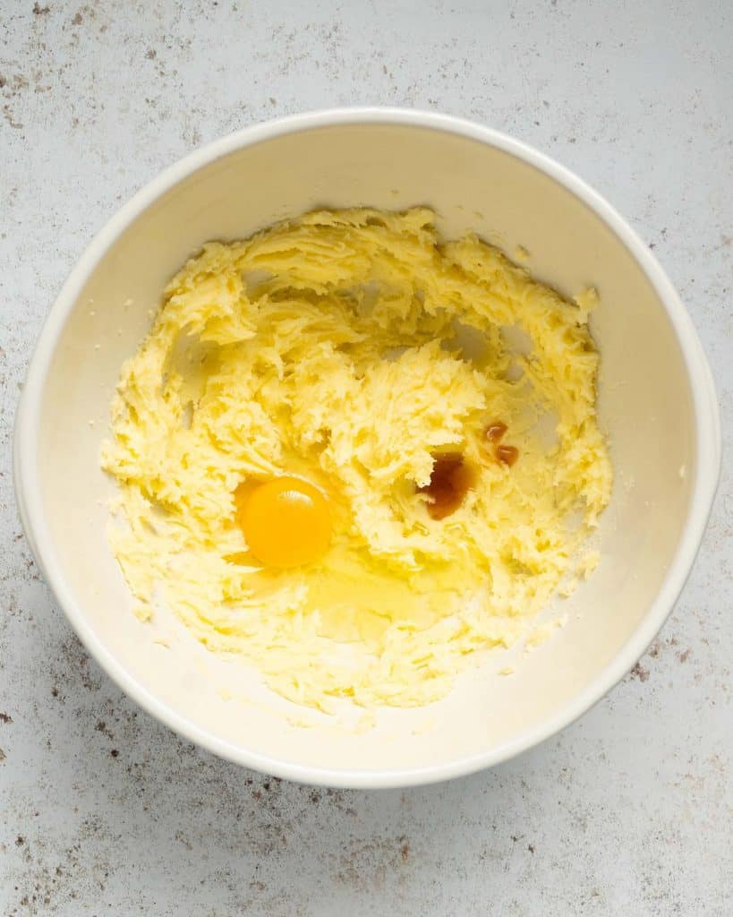 Mixing together the butter and sugar with egg and vanilla...