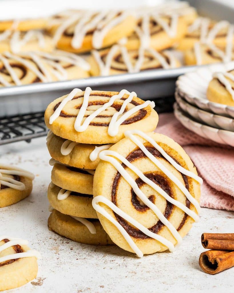 Who doesn't love cookies and cinnamon rolls! So when craving them both, why not put them together! And so my cinnamon roll cookies were born! Recipe by movers and bakers