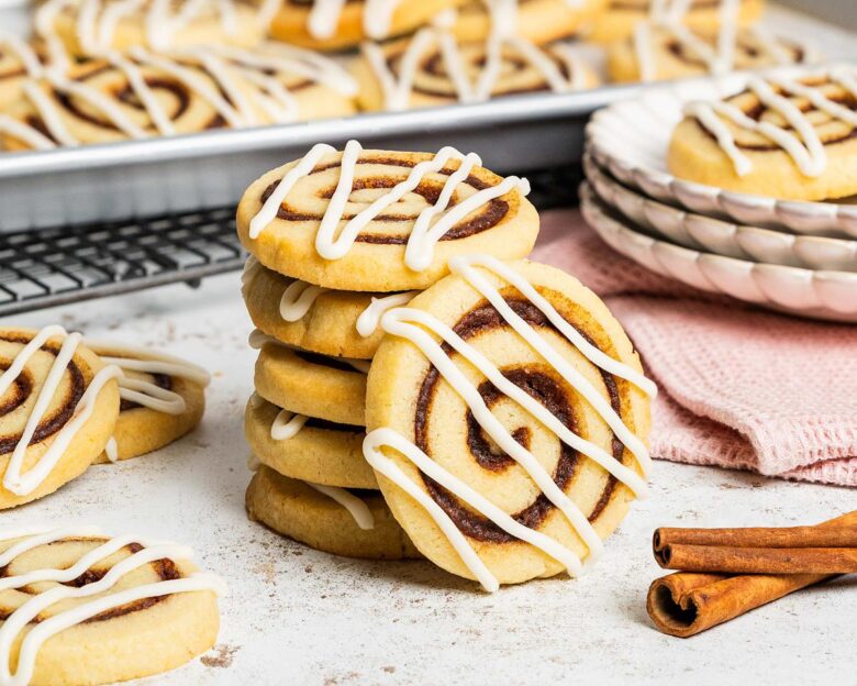 Who doesn't love cookies and cinnamon rolls! So when craving them both, why not put them together! And so my cinnamon roll cookies were born! Recipe by movers and bakers
