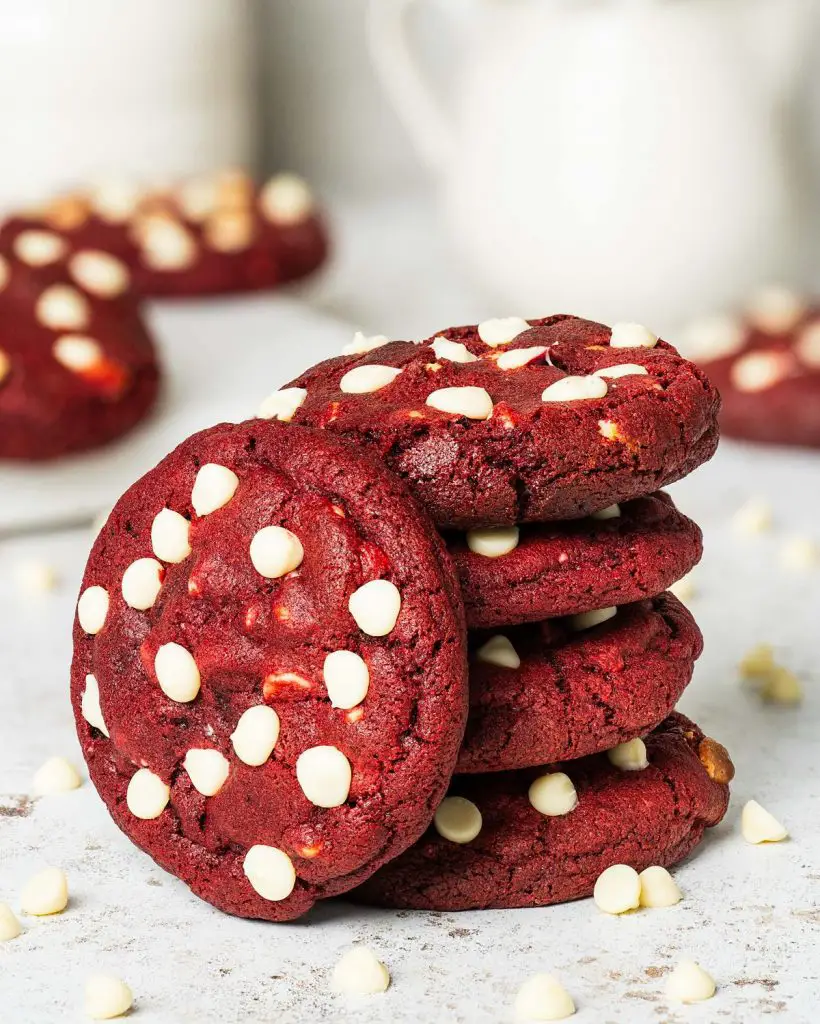 Red velvet cookies are chewy and moreish and oh so irresistible. Serve with a glass of cold milk for the ultimate indulgence! Recipe by movers and bakers