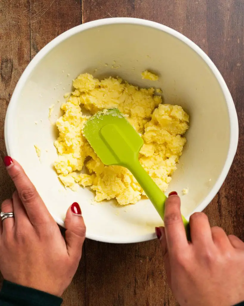 Mixing the butter and sugar together until evenly combined and smooth...