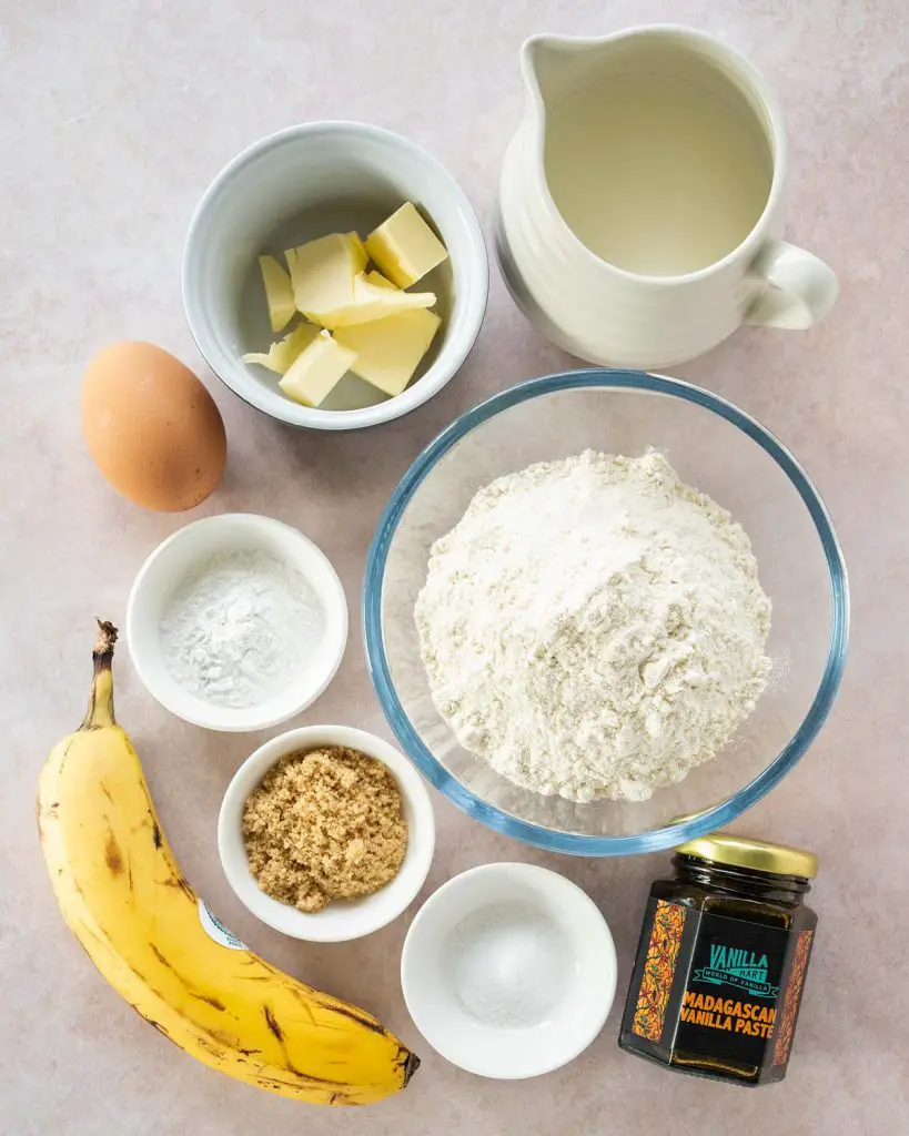 Ingredients required: plain (all purpose) flour, baking powder, salt, banana, unsalted butter, an egg, buttermilk (yogurt and milk), brown sugar and vanilla. Recipe by movers and bakers