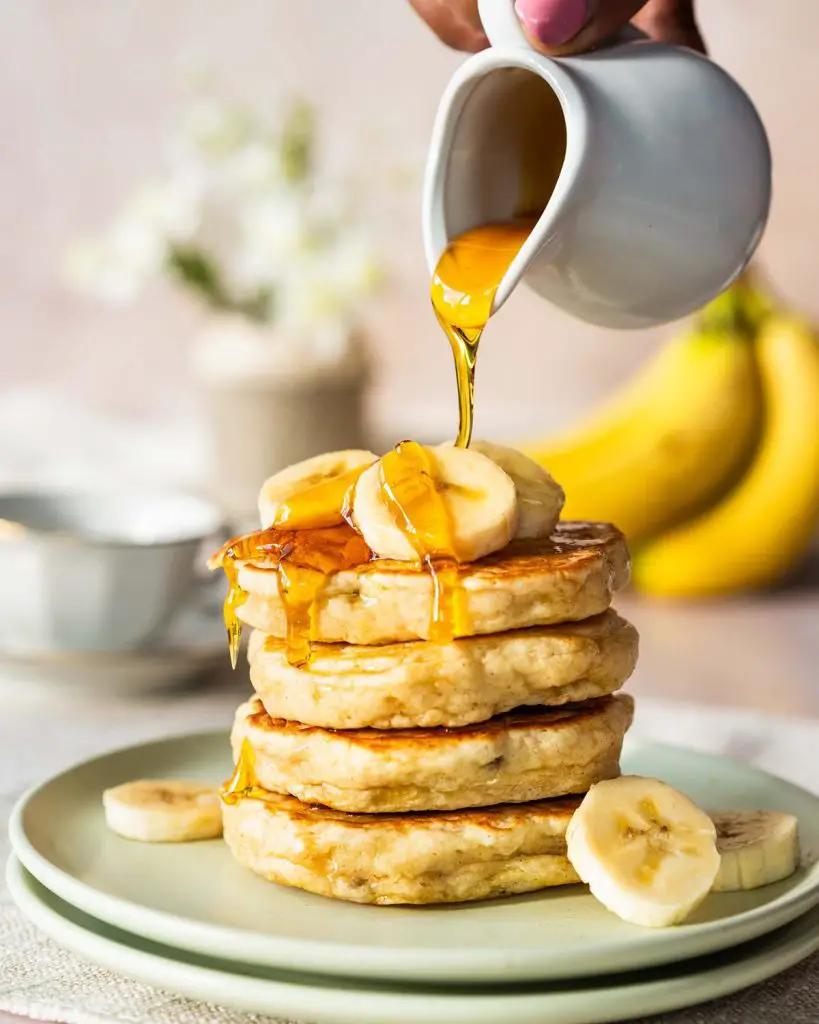 My fluffy banana pancakes are thick but light and airy and so easy to make! Perfect for a lazy weekend brunch or a quick after school snack! Recipe by movers and bakers