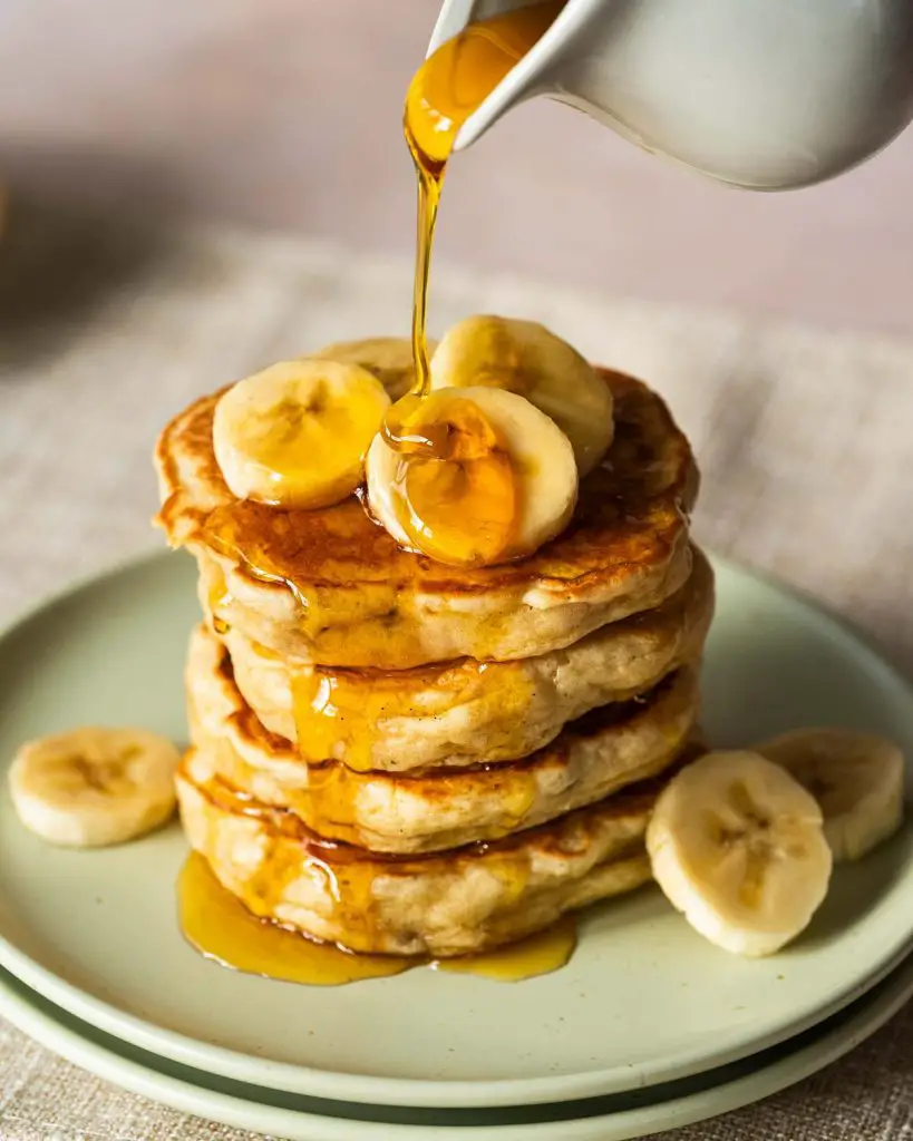 My fluffy banana pancakes are thick but light and airy and so easy to make! Perfect for a lazy weekend brunch or a quick after school snack! Recipe by movers and bakers